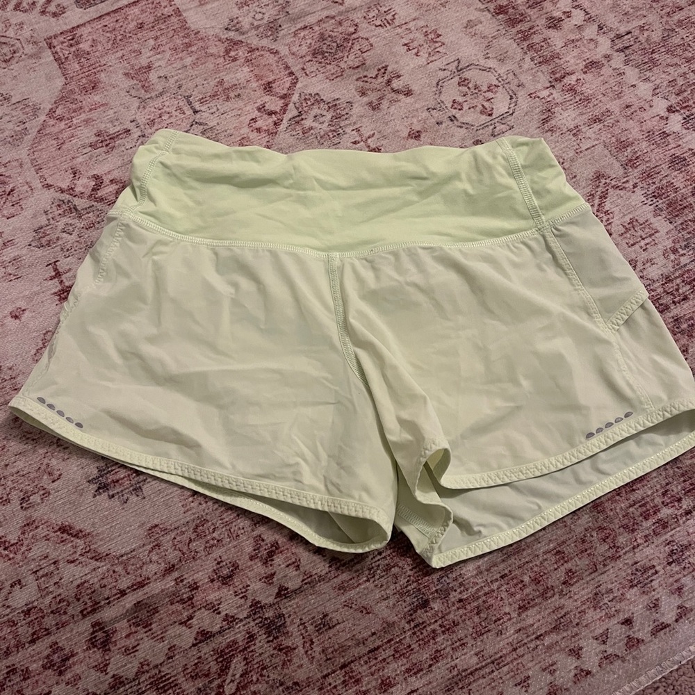 lululemon light green/yellow rare shorts, 4 inch size 4!